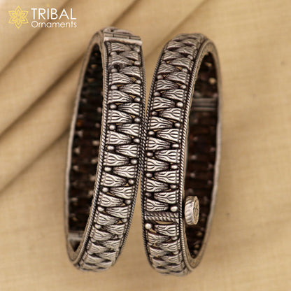 Vintage tribal design 925 sterling silver ethnic bangle bracelet by TRIBAL ORNAMENTS, featuring intricate ethnic jewelry detailing.