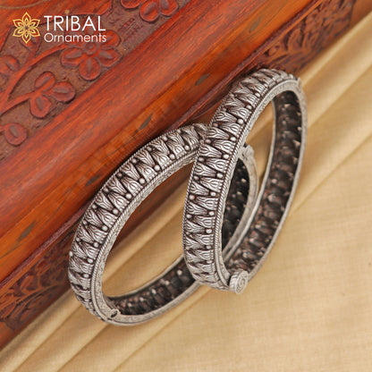 Sterling silver vintage ethnic bangle bracelet with tribal design, crafted by TRIBAL ORNAMENTS, showcasing traditional jewelry craftsmanship.