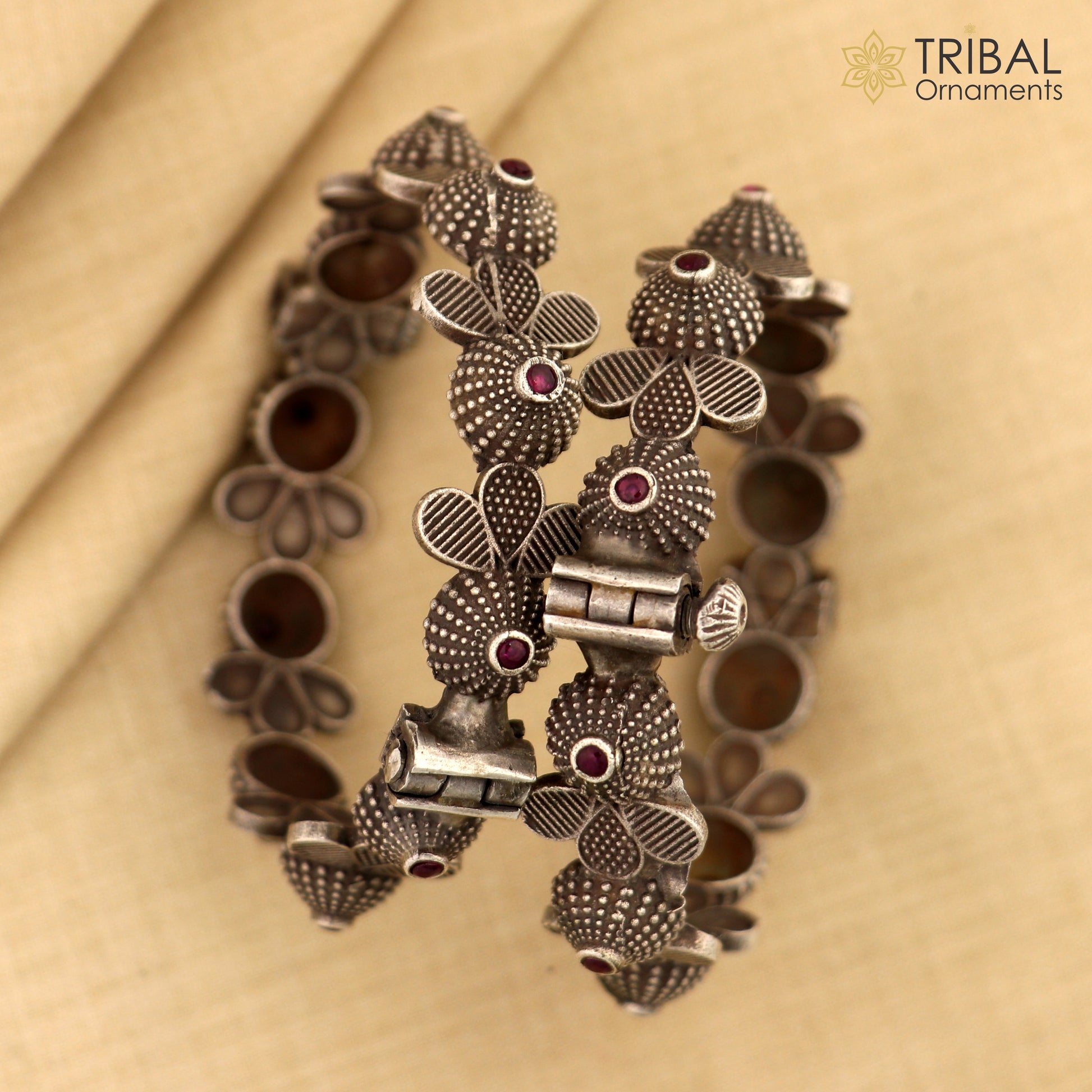 Sterling silver tribal bangle bracelet with red stone work, featuring vintage tribal design, ideal for wedding jewelry.