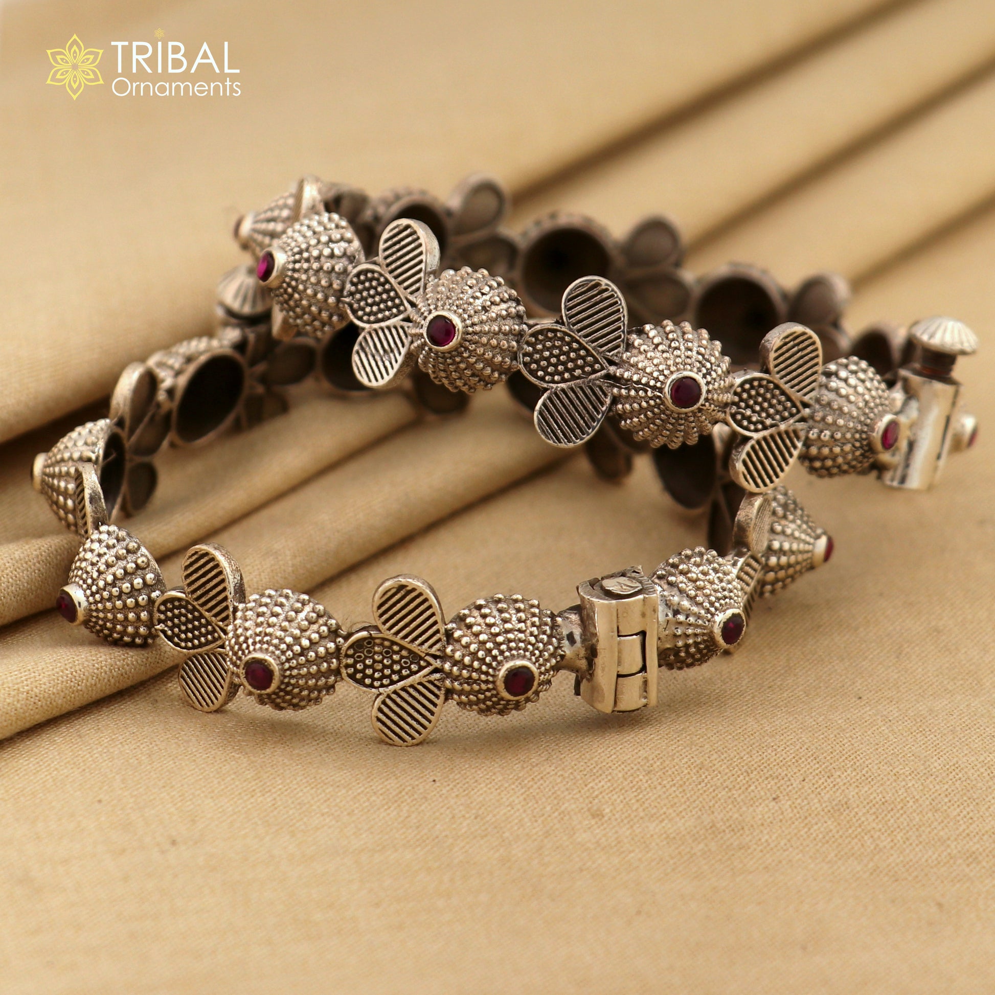 Sterling silver tribal bangle bracelet with red stone accents, traditional wedding jewelry design, by TRIBAL ORNAMENTS.