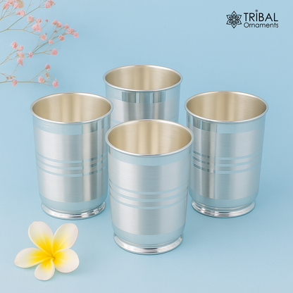 Handmade 999 pure fine silver water and milk tumbler, all sizes, with intricate tribal ornament design for dining and gift use.