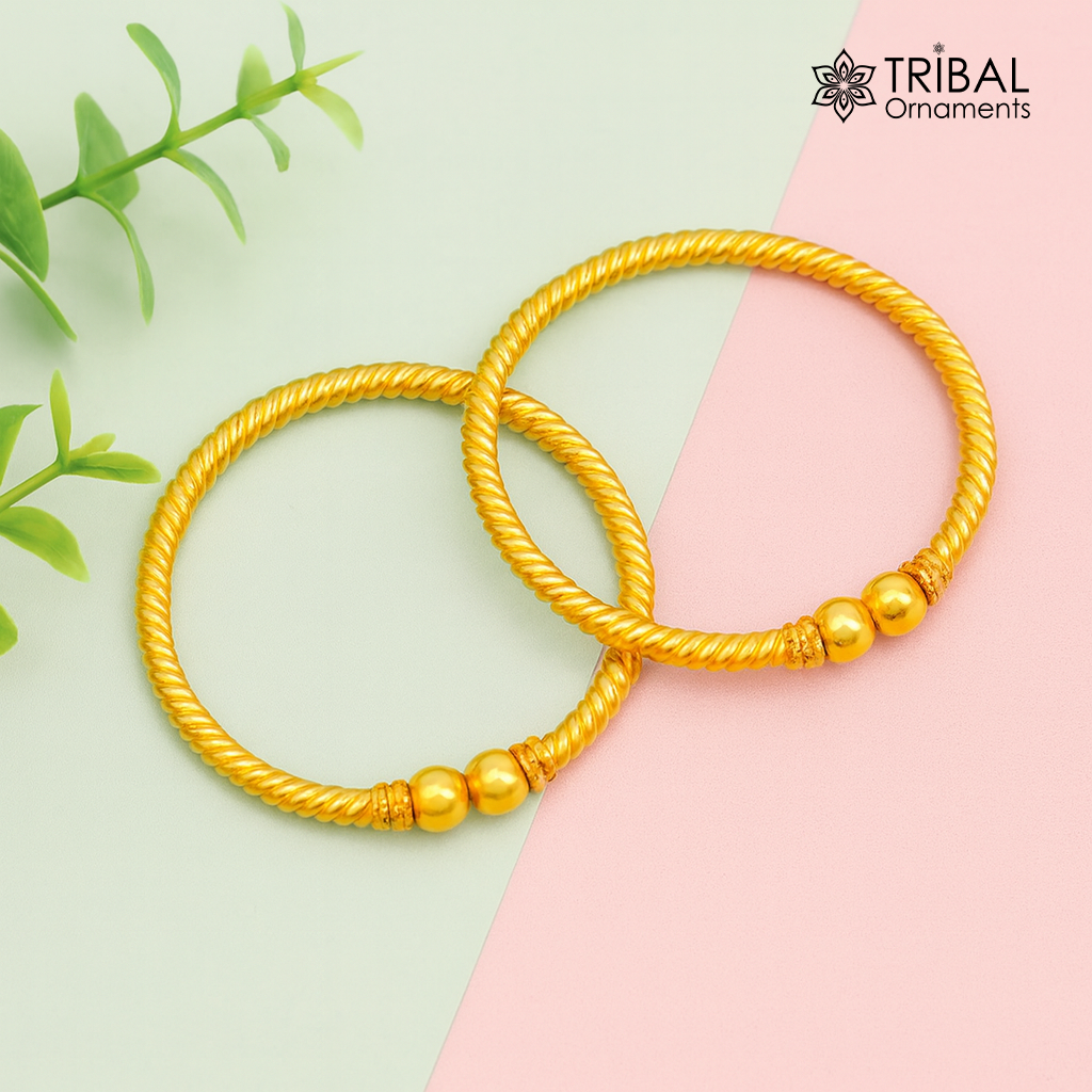 22K yellow gold baby bangle by Tribal Ornaments featuring vintage ball face design, handmade and hallmarked for kids.