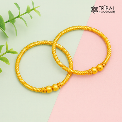 22K yellow gold baby bangle by Tribal Ornaments featuring vintage ball face design, handmade and hallmarked for kids.