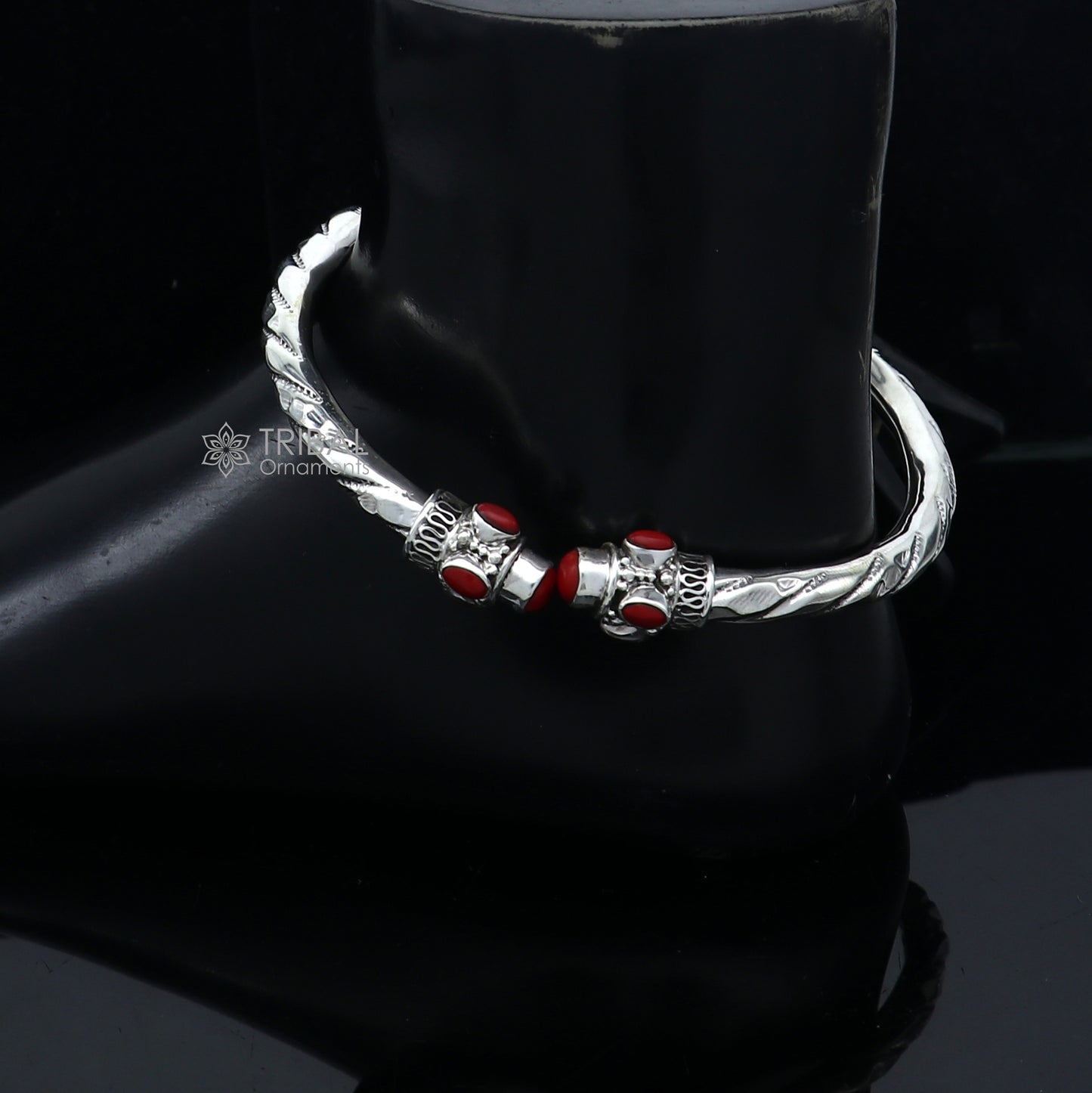 Sterling silver ankle kada bracelet with stylish design and vibrant coral stone, crafted by Tribal Ornaments.