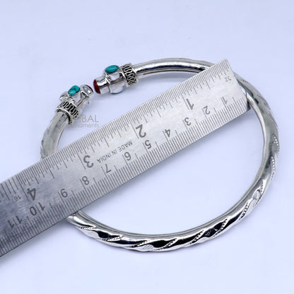 Sterling silver ankle kada bangle with stylish design and multi-color stones, perfect for elegant ankle jewelry.