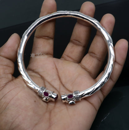 Sterling silver ankle kada bracelet with stylish design and red stone accent, featuring a traditional foot kada from Tribal Ornaments.