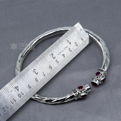 Sterling silver ankle kada bracelet by TRIBAL ORNAMENTS with stylish design and red stone accent for foot jewelry.