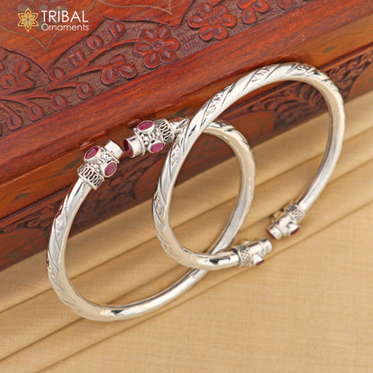 Sterling silver ankle kada bracelet with stylish design and red stone accent, from TRIBAL ORNAMENTS.