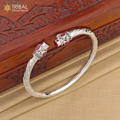 Sterling silver ankle kada bracelet with stylish design and red stone accent, crafted by TRIBAL ORNAMENTS.