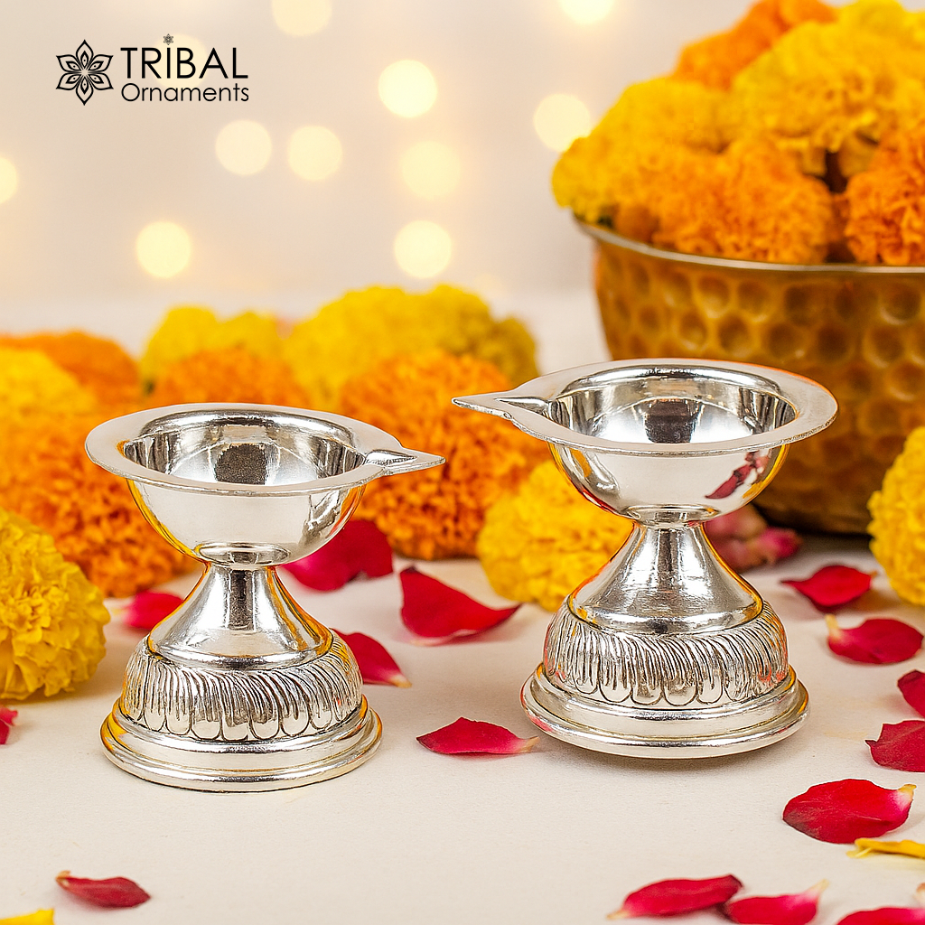 Sterling silver oil lamp with customized chitai and kandrai work, traditional Deepak for puja and temple rituals.