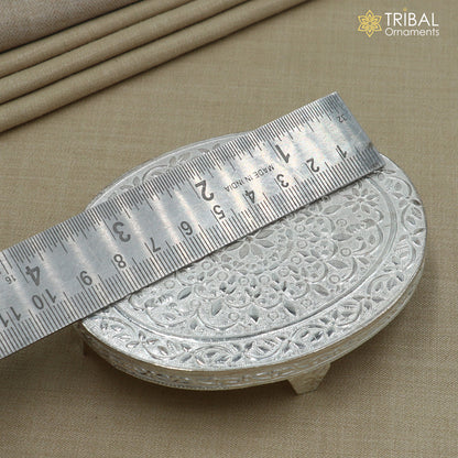 925 Sterling silver oval-shaped bazot or chouki pooja utensil by TRIBAL ORNAMENTS, showcasing intricate design and craftsmanship.
