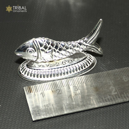 925 sterling silver fish representing Lord Vishnu's Matsya avatar, symbolizing prosperity and good luck, by TRIBAL ORNAMENTS.
