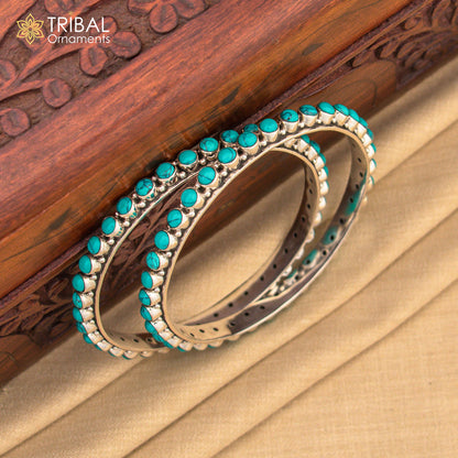 925 sterling silver bangle with turquoise stone from TRIBAL ORNAMENTS, featuring intricate tribal design and pure silver craftsmanship.