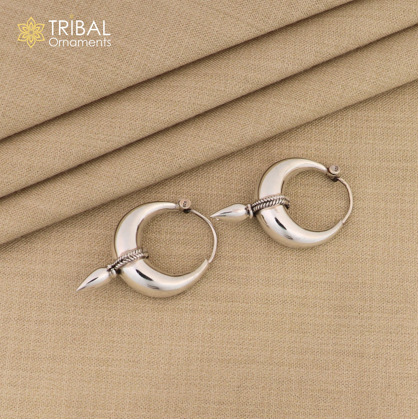 Sterling silver tribal hoop earrings with a shiny, plain design, Bali-inspired, unisex style for belly dance or tribal jewelry.