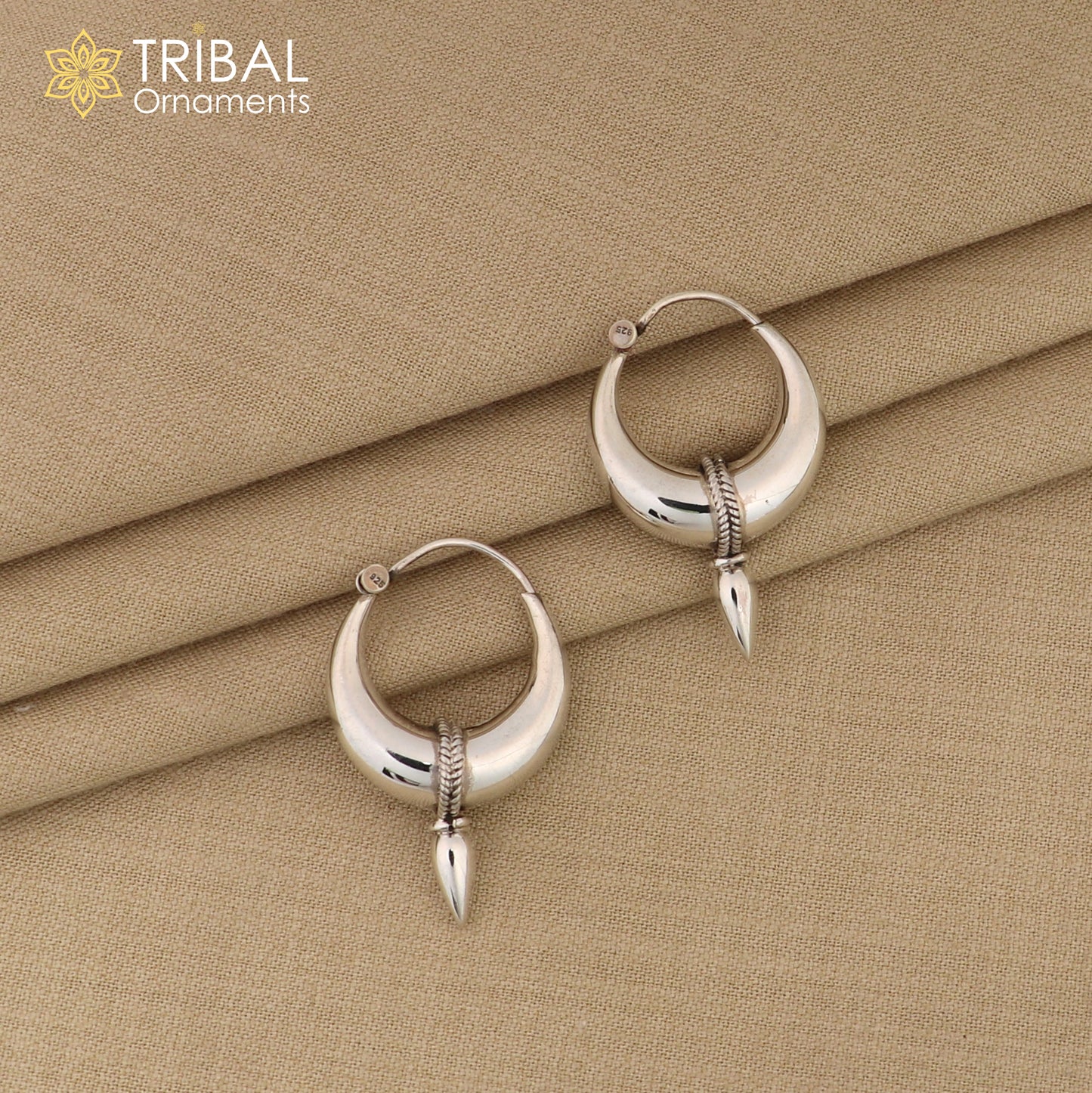 Sterling silver hoop earrings by TRIBAL ORNAMENTS, plain shiny Bali-style tribal jewelry for unisex belly dance or tribal fashion.