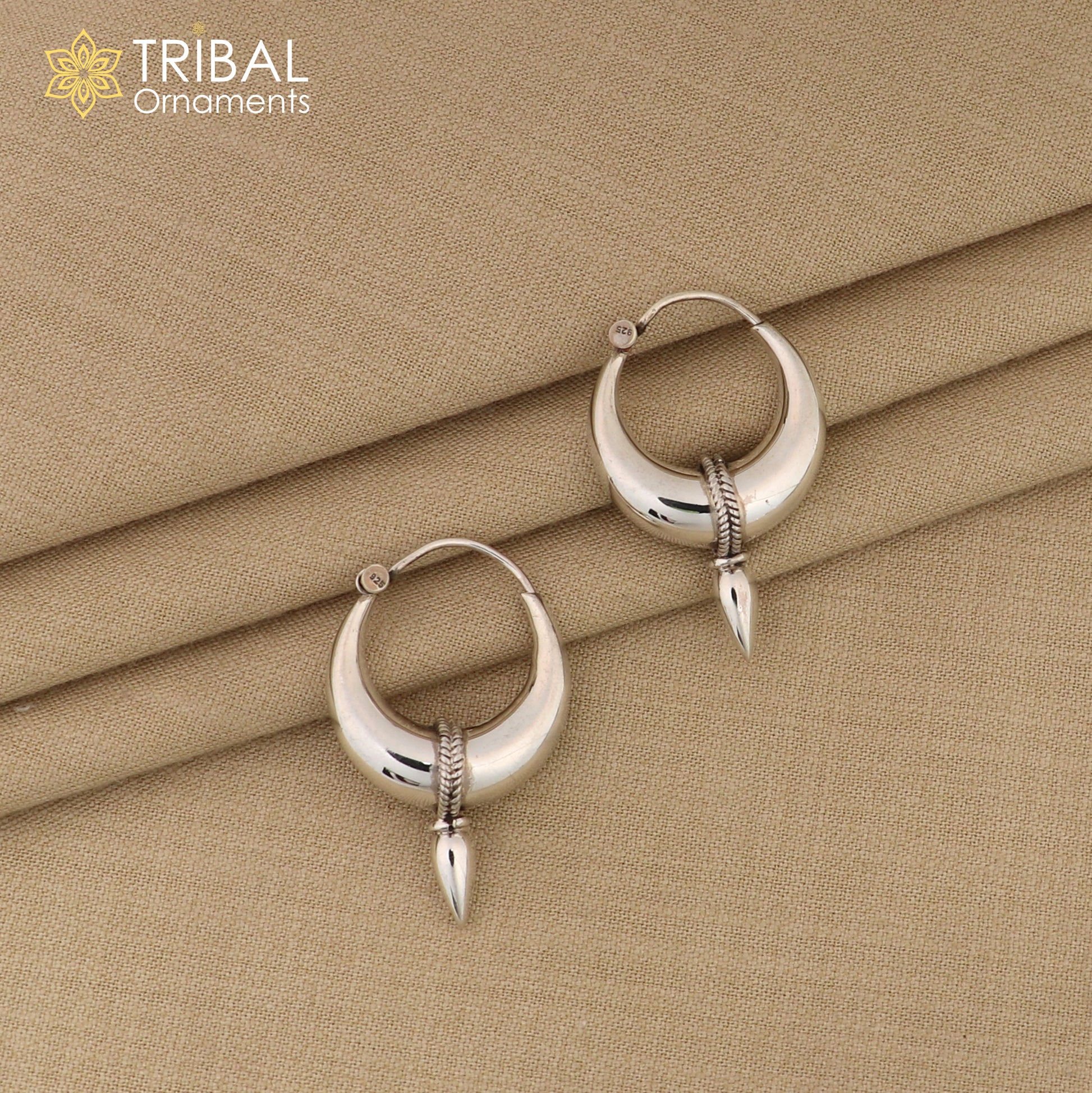 Sterling silver hoop earrings by TRIBAL ORNAMENTS, plain shiny Bali-style tribal jewelry for unisex belly dance or tribal fashion.