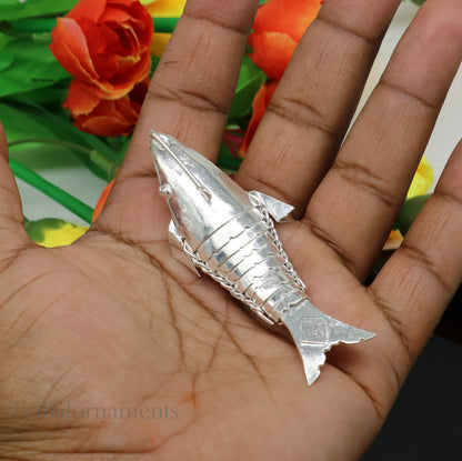 Solid silver Lord Vishnu avatar Matsya fish pendant, handmade for prosperity and good luck, crafted by Tribal Ornaments.
