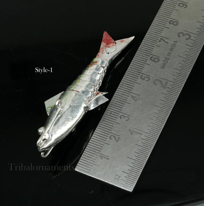 Solid silver Lord Vishnu Matsya fish pendant, handcrafted for prosperity and good luck, in tribal ornament style.