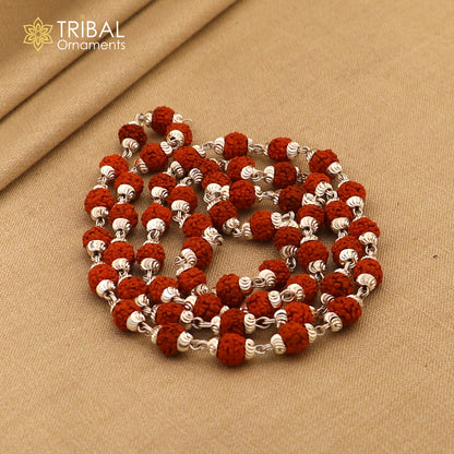 Handmade silver chain necklace with natural Rudraksha beads, unisex tribal jewelry featuring silver caps and intricate design.