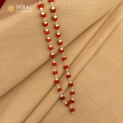 Handmade silver chain necklace with natural rudraksha beads, unisex tribal jewelry by TRIBALORNAMENT, showcasing an intricate design.