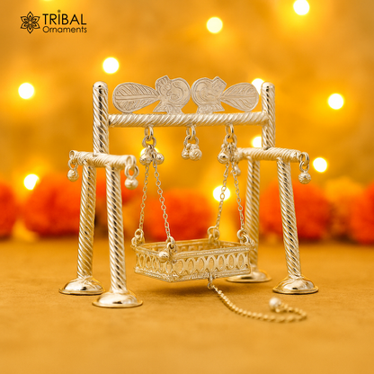 Handmade 925 sterling silver Bal Gopala jhula swing featuring Little Krishna, detailed silver art for Laddu Gopal or child Krishna.