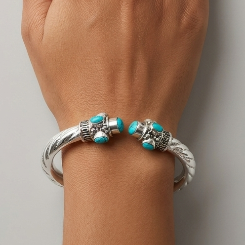 Sterling silver blue turquoise stone cuff bangle featuring intricate tribal design, perfect for customized jewelry gifting.