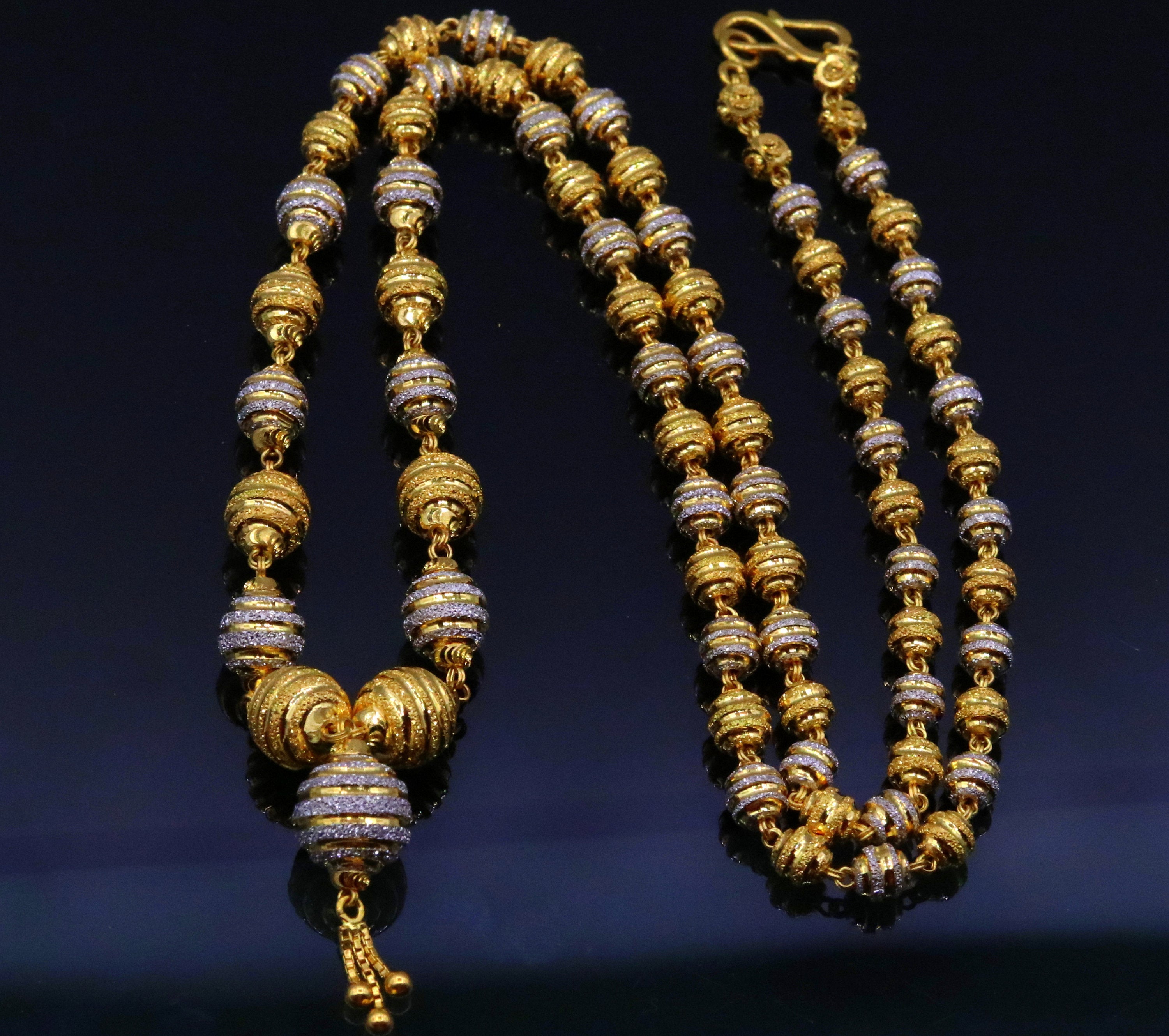 Pick this simple 22ct gold Mala Neckwear at PureJewels UK