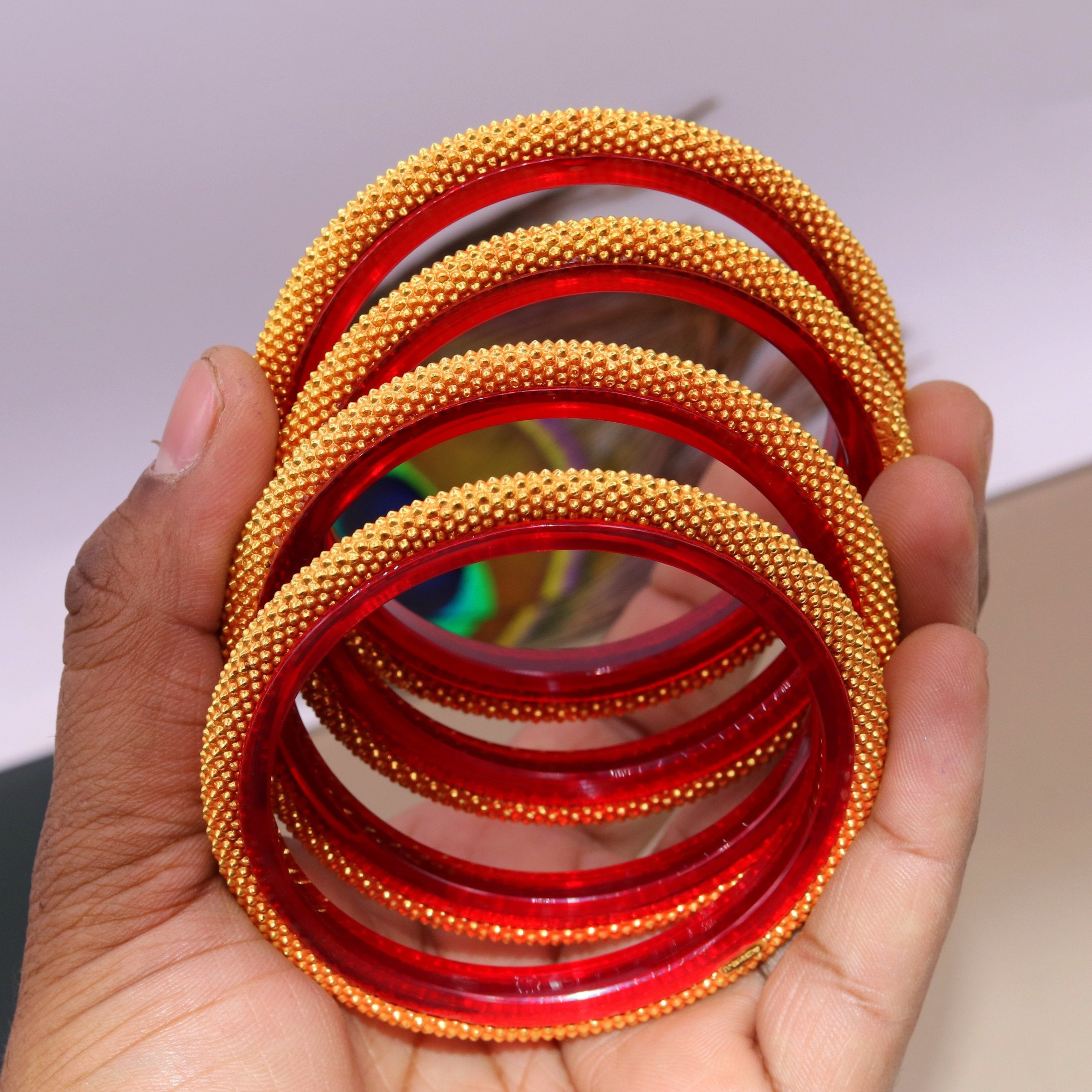 Plastic bangle with 2025 gold design