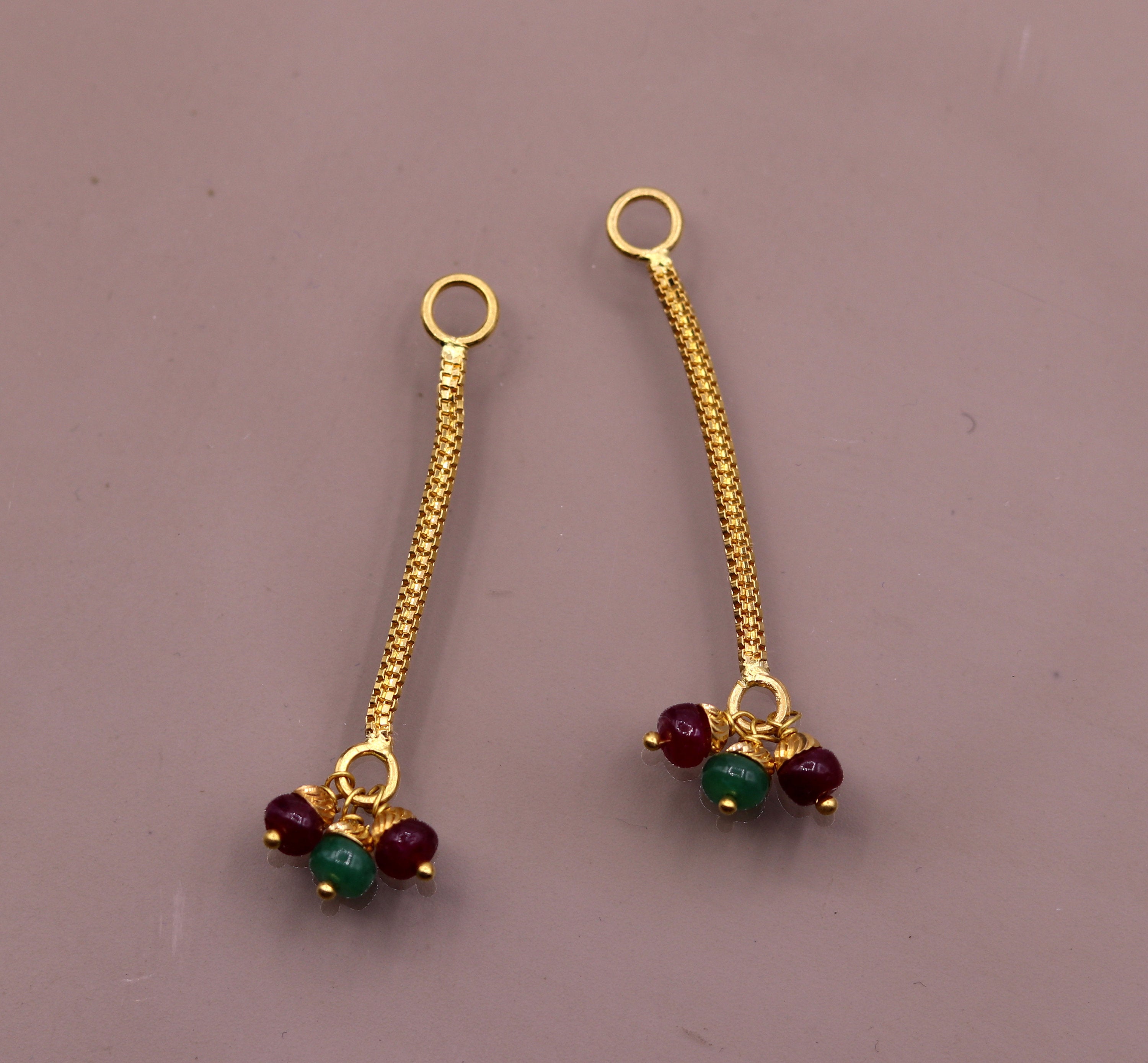 Floral design crystal hanging earrings.
