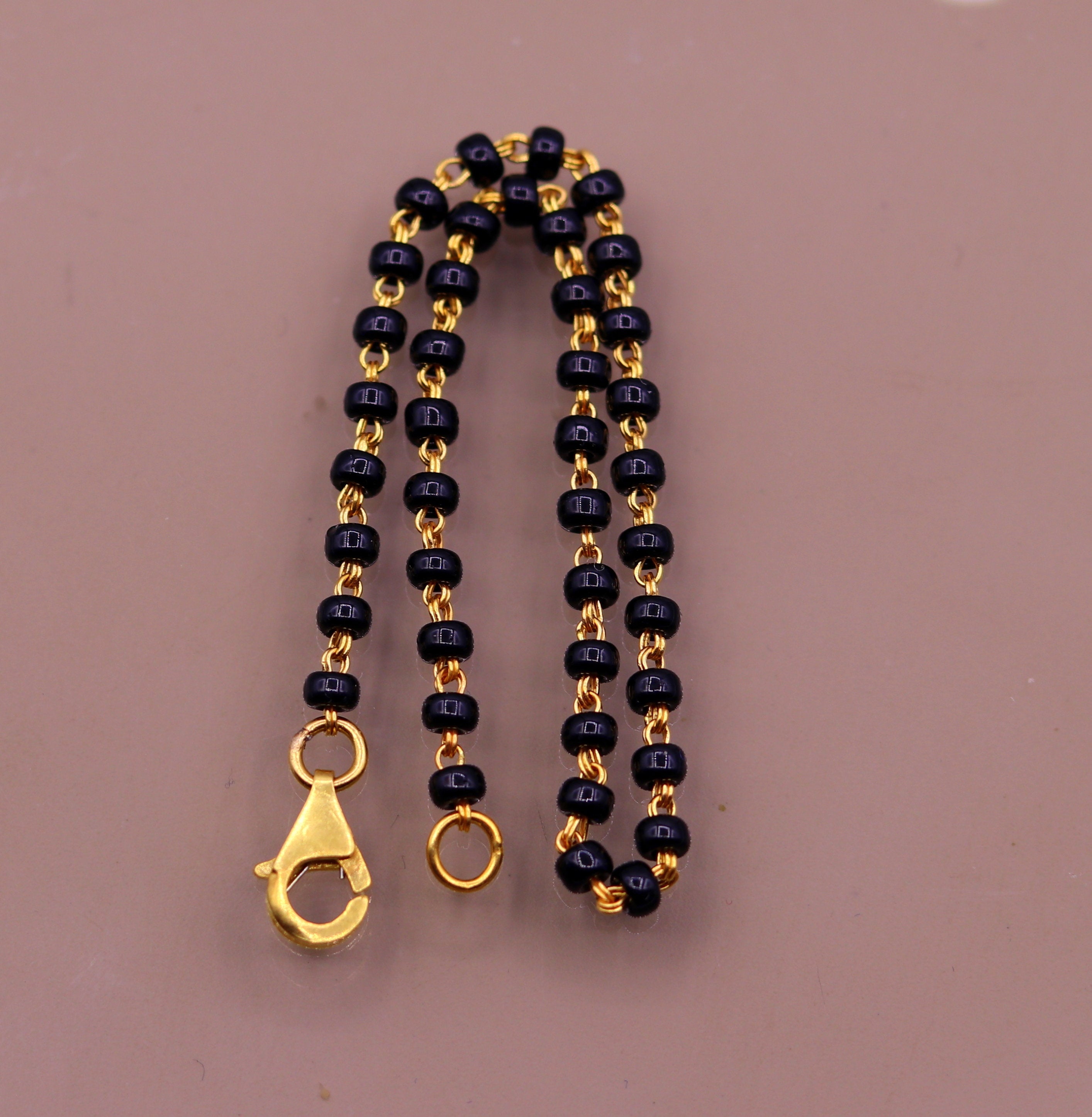 Light weight gold store black beads chain