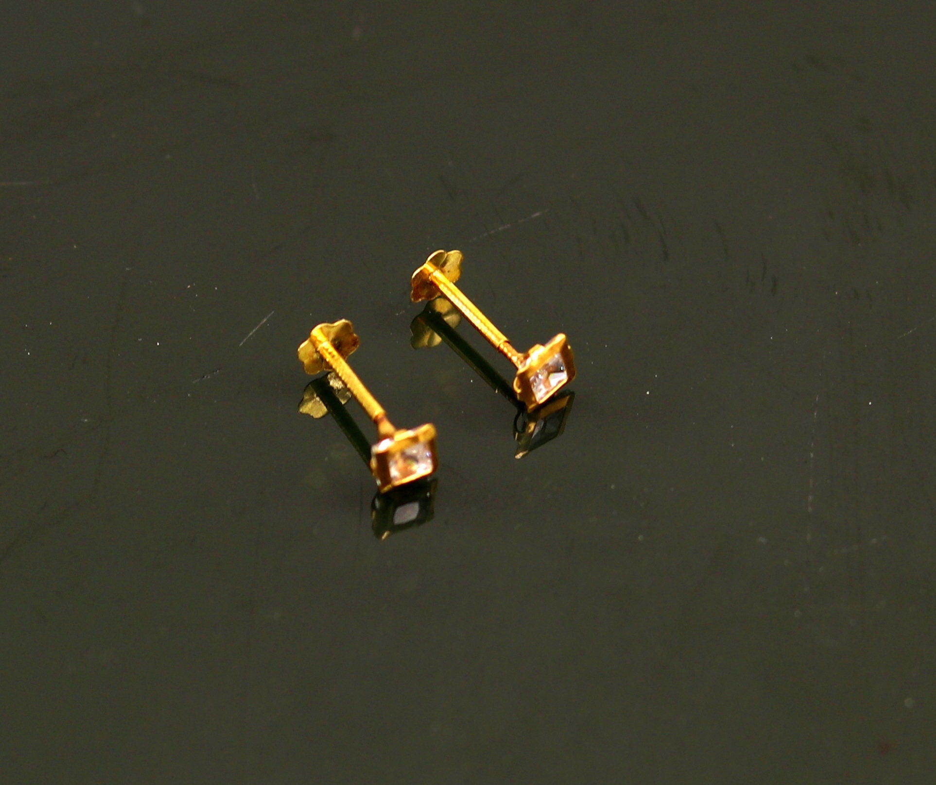 Single stone gold deals studs