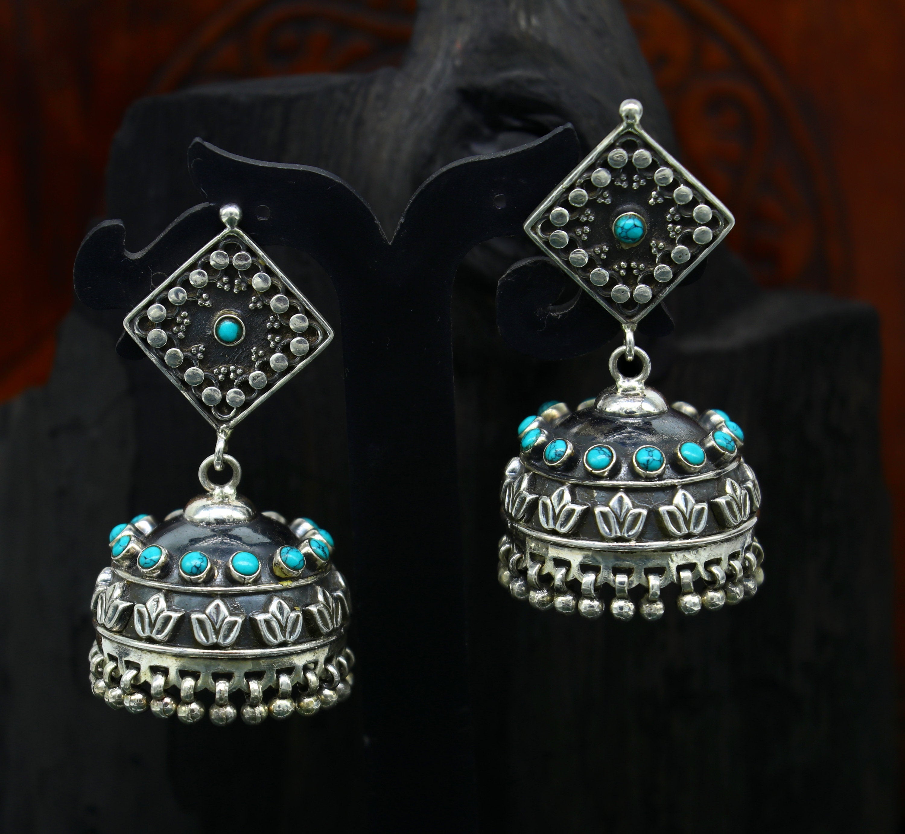 Buy Latest White and Ruby Stone Jhumka Earrings Gold Design