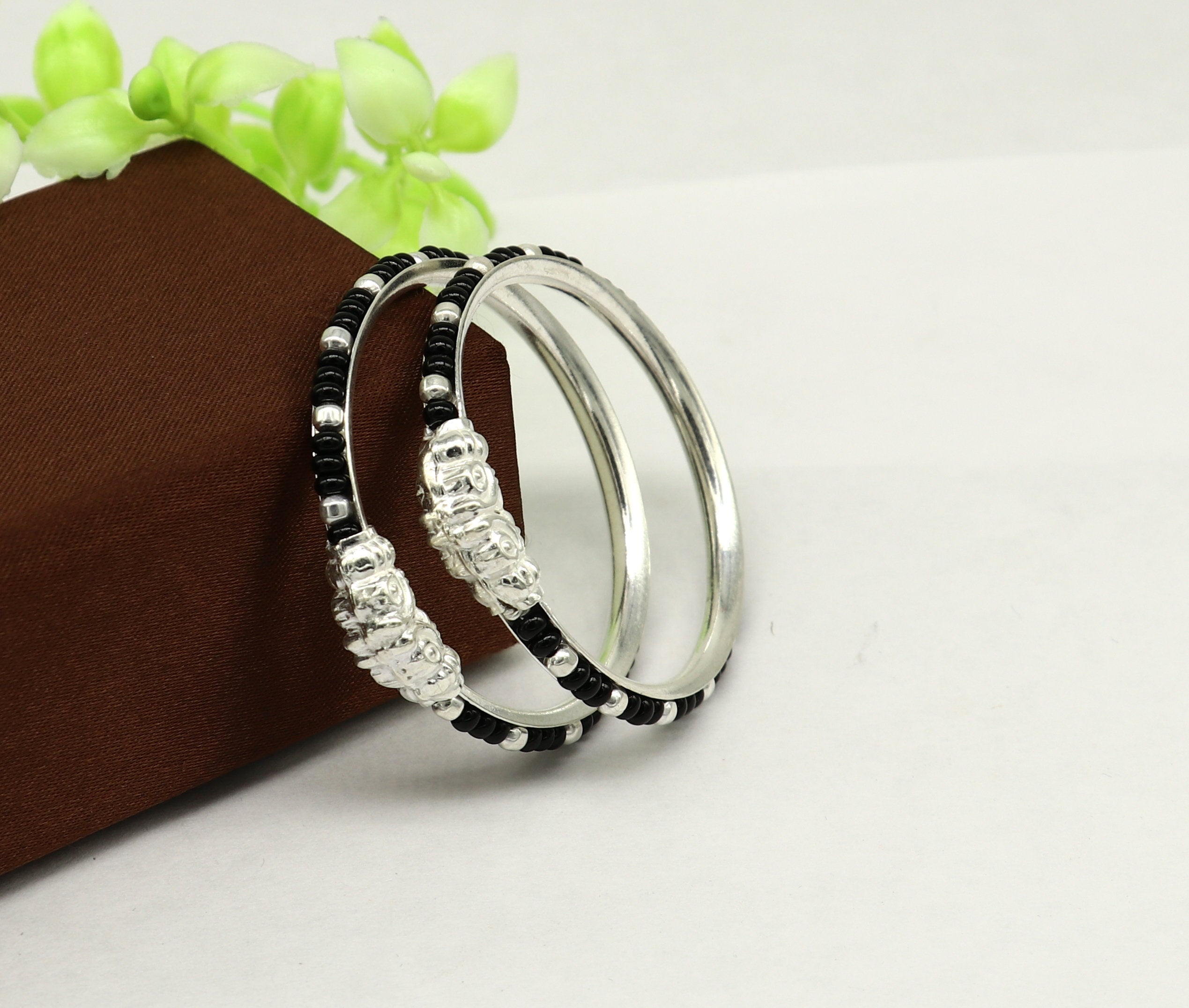 Silver baby bangles sale with black beads