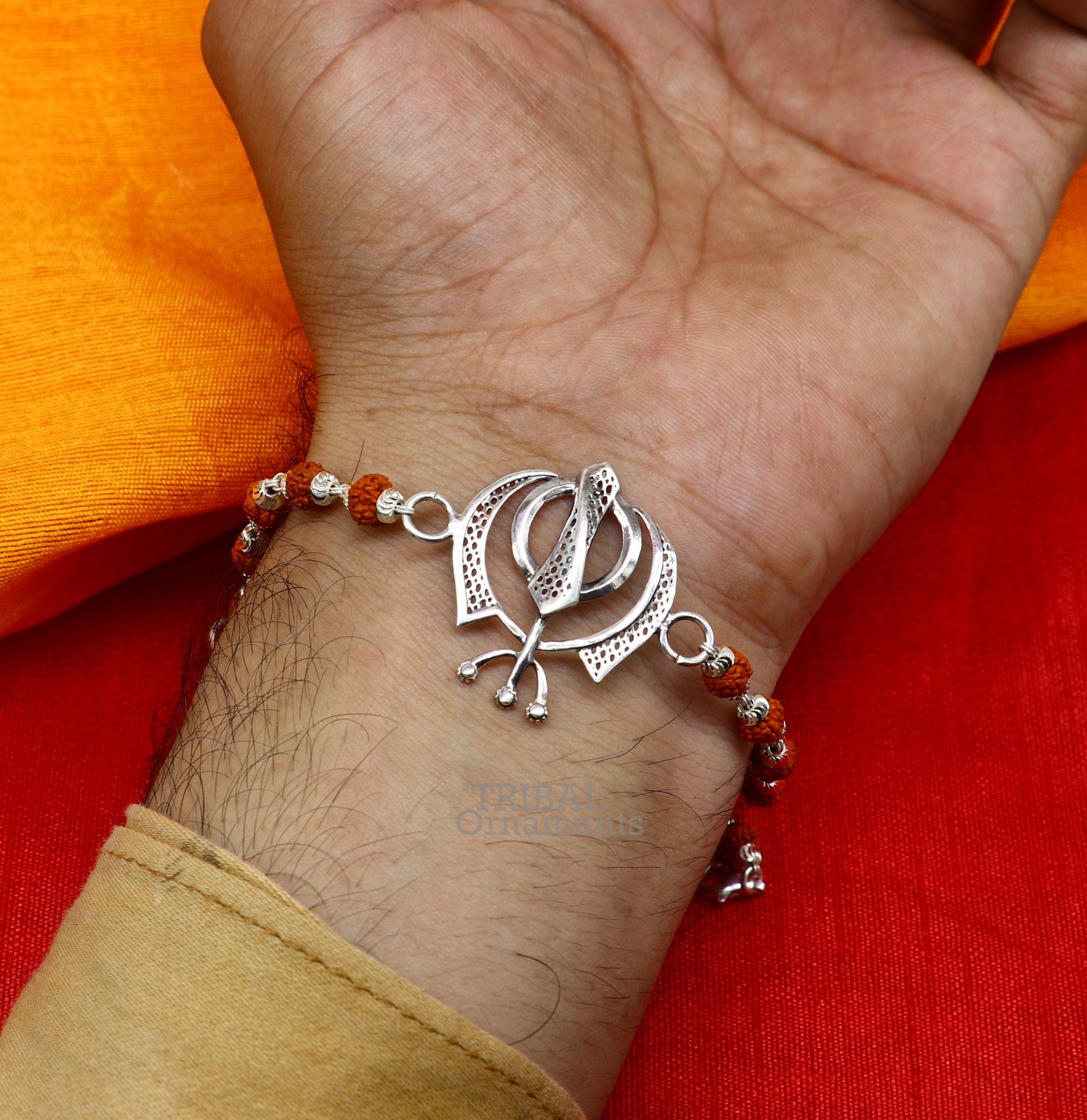 Dwarkadhish Silver Rakhi Tie Bracelet With Silver Charms For Brothers