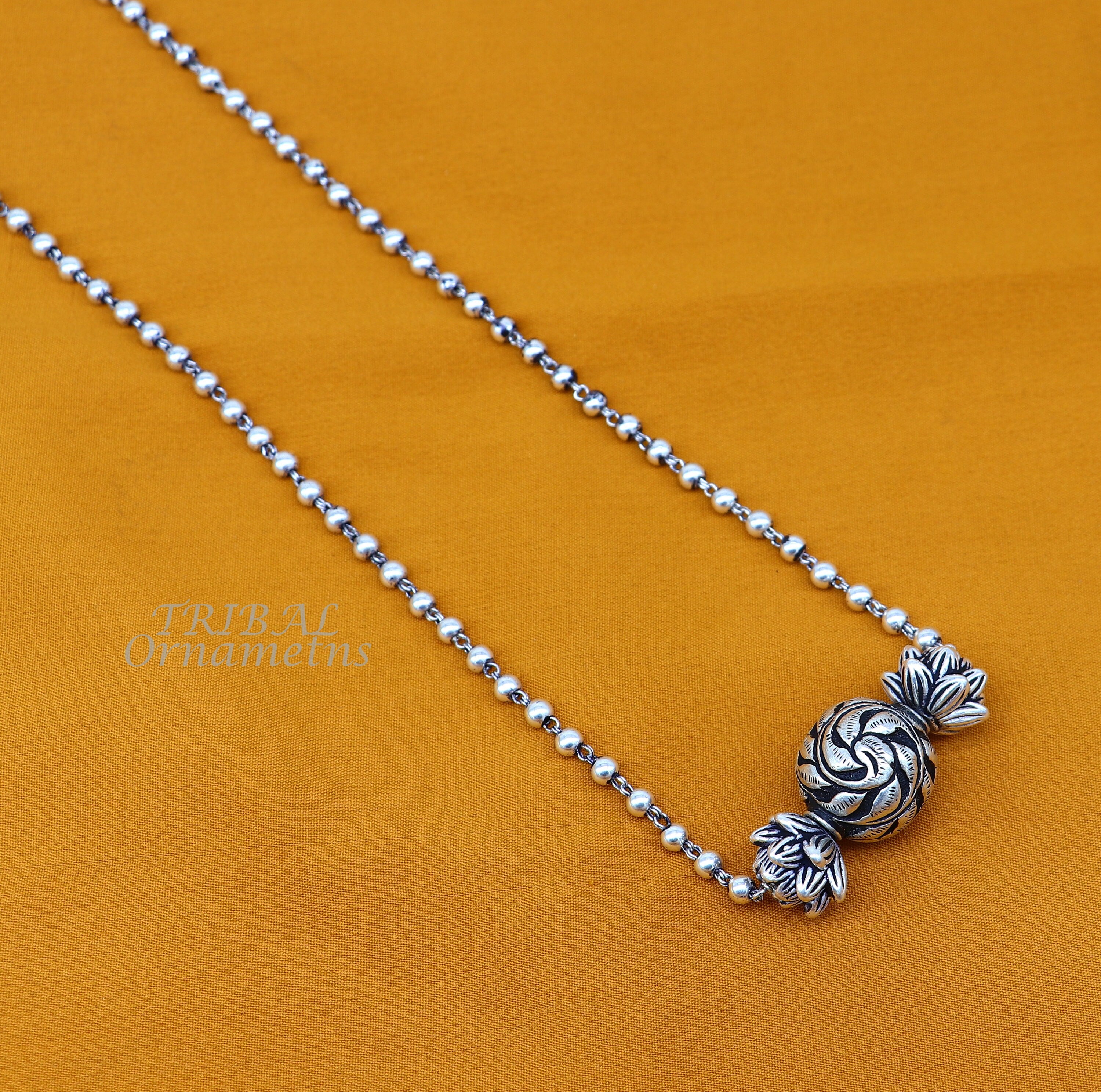 Long silver hot sale ball necklace