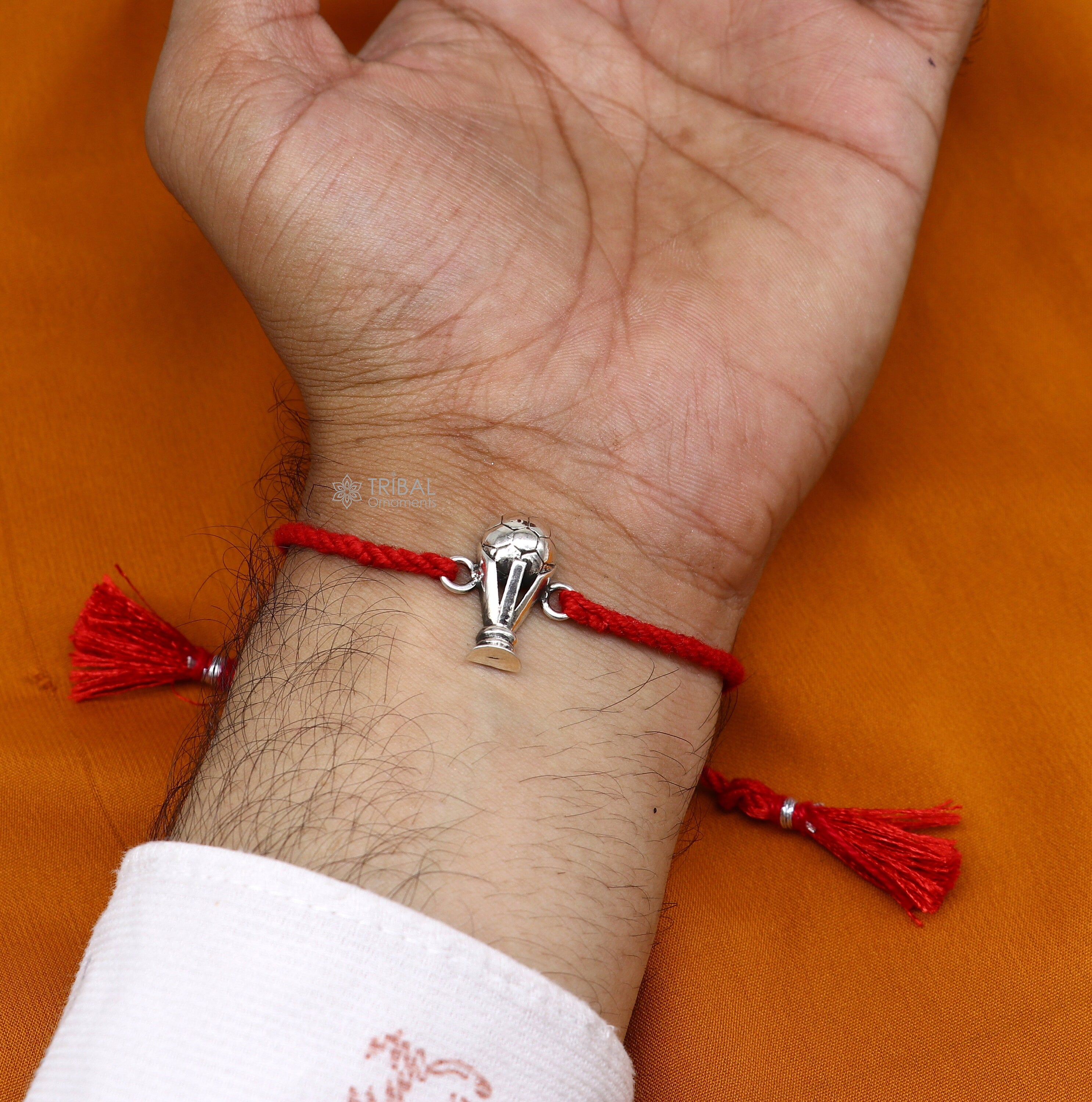 Rakhis Online Australia- Red Pearl bracelet Rakhi – Ghasitaram Gifts