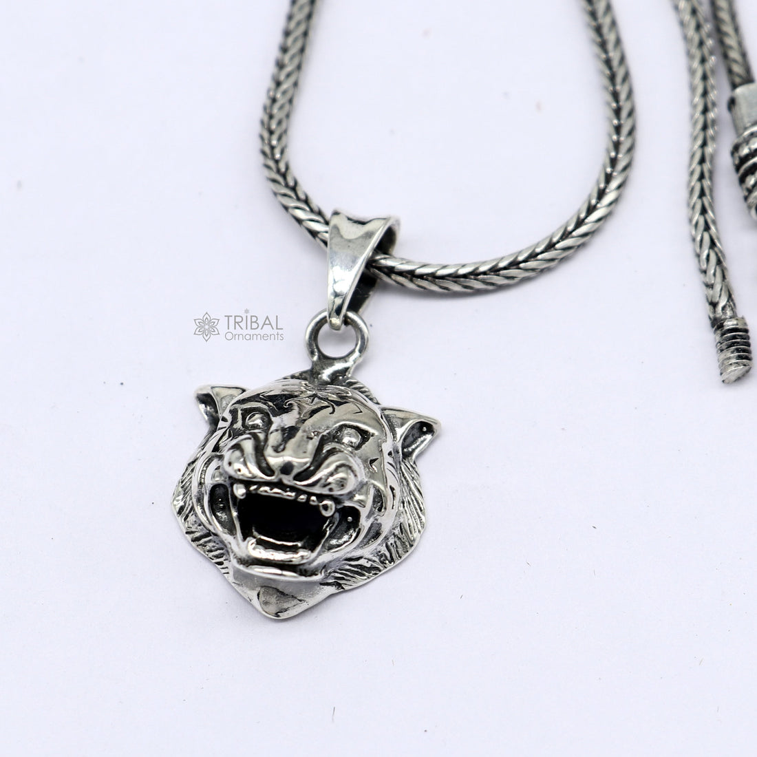 925 sterling silver LION FACE pendant symbolizes qualities associated with lions, such as courage, strength, and leadership nsp707 - TRIBAL ORNAMENTS