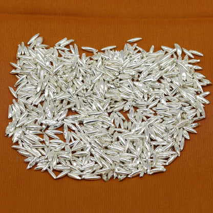 Tiny 999 silver rice Akshat and chawal for puja, traditional silver worshipping article from India by TRIBAL ORNAMENTS.