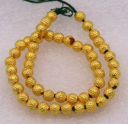 Vintage handmade 22kt yellow spotted gold beads from Rajasthani tribal style, ideal for unique jewelry making.