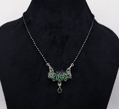 925 sterling silver black beads chain Mangalsutra necklace with green stone pendant, tribal ornaments design for daily wear and brides.