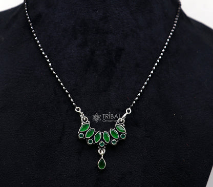 925 sterling silver Mangalsutra necklace with black beads, green stone pendant, tribal design, for daily wear and brides.