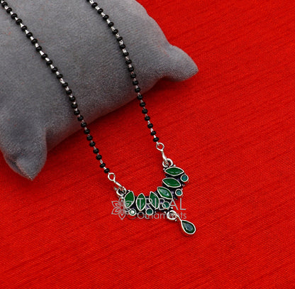 925 sterling silver mangalsutra necklace with black beads, green stone pendant, and chain for daily wear and brides by TRIBAL ORNAMENTS.