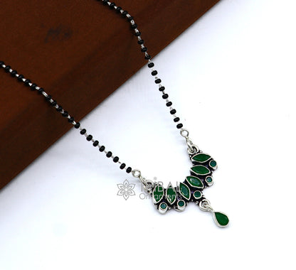 925 sterling silver Mangalsutra necklace with black beads, green stone pendant, tribal ornaments design for daily wear or brides.