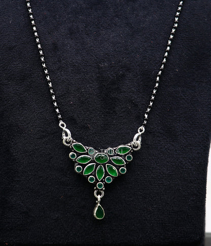 Sterling silver Mangalsutra necklace with black beads, green stone pendant, designed for daily wear and brides from Tribal Ornaments.