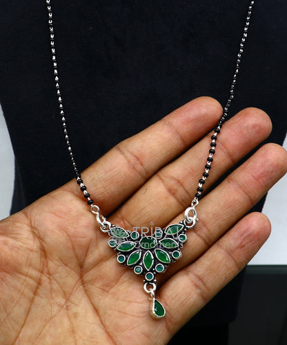 925 sterling silver black beads chain Mangalsutra necklace with green stone pendant, designed for daily wear and traditional Indian jewelry.