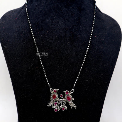 925 sterling silver black beads mangalsutra necklace with love bird pendant, ideal for brides and daily wear by TRIBAL ORNAMENTS