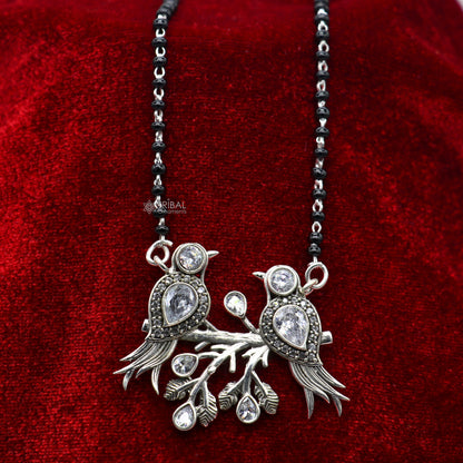 Sterling silver black beads mangalsutra necklace with love bird pendant, designed for brides and daily wear by TRIBAL ORNAMENTS.