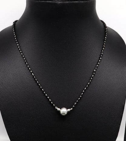 Sterling silver black beads Mangalsutra necklace set for brides, featuring a ball design and traditional Indian style.