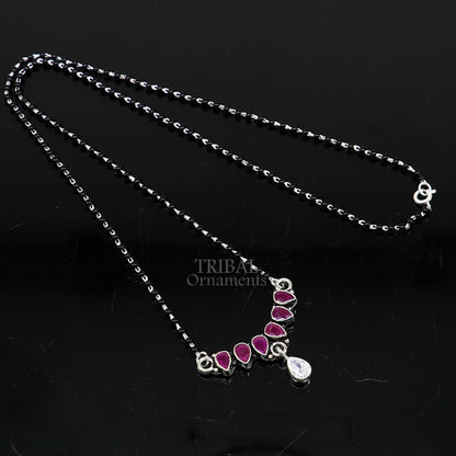 925 sterling silver black beads Mangalsutra necklace with pink stone and floral pendant, traditional Indian bridal jewelry.