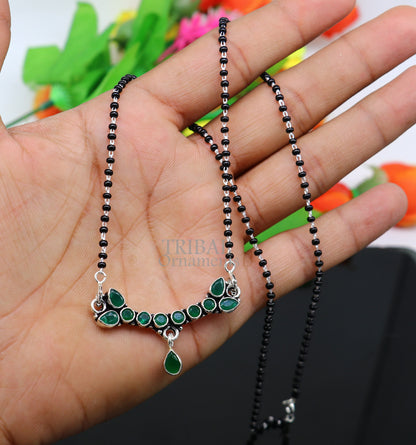 925 sterling silver Mangalsutra necklace with black beads and green stone from TRIBAL ORNAMENTS, featuring a chunky chain design.